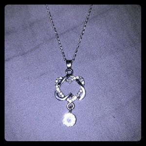 Intertwined hearts necklace